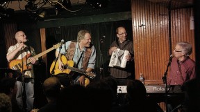 John Forster (at keyboard, right) with Tom Chapin (center) and his band, playing at the Turning Point in Piermont, New  York.
