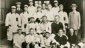 Harvard’s 1912 baseball team. Wingate (front at left, holding cap) was Fenway’s first batter.