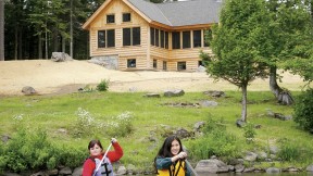 Paddling on Long Pond with the Appalachian Mountain Club’s Gorman Chairback Lodge in the background