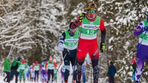 James Kitch on a trail, skiing in front of a competitor