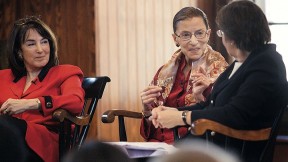 U.S. district judge Nancy Gertner (left) listens as Linda Greenhouse ’68, formerly the Supreme Court reporter for the <em>New York Times,</em> questions Supreme Court Justice Ruth Bader Ginsburg.