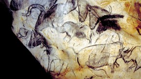 The human urge to create art appears magnificently in the Paleolithic paintings from roughly 30,000 years ago at Chauvet Cave, in southern France. Here, the Panel of the Horses.
