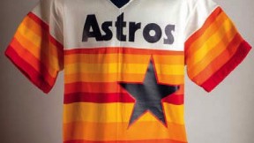 Photo of red, white, and orange Houston Astros jersey from 1983 worn by pitcher Joe Niekro