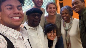A group photo of the four Harvard undergraduates, including the author, with their project adviser and two local, older mentors