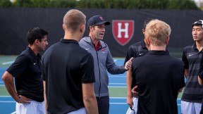 Andrew Rueb speaks to members of his team.