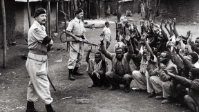 British soldiers and local police searching homes to interrogate subjects during Mau May rebellion, c. 1954