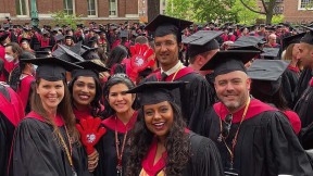 Harvard students in caps and gowns 