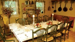 Meals are served at two communal tables in the restored barn.