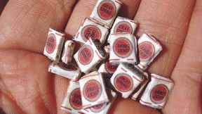 Getting them while they’re young: tiny cigarette packs, meant for children to incorporate into their play with dolls or toy soldiers