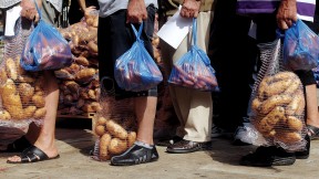 Hunger stalks southern Europe: A nationalist political party distributes food in Athens, September 14, 2012. 