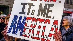 Protestors with a large poster demanding reform of the Electoral College