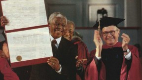 Photograph of Nelson Mandela receiving honorary degree and University Marshal Rick Hunt
