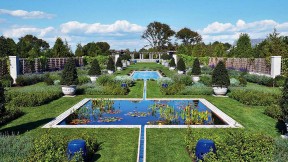 Wide view of blue pools and lawns of the Blue Garden 