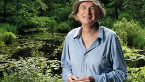 Volunteer guide Al Levin at the Lily Pond in Garden in the Woods