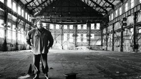John Fetterman stands inside the defunct Carrie Furnance Works (1884-1982), which he hopes will be turned into  a museum and national park down the river from Braddock.