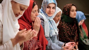Wearing hijab, Muslim women from the United States and around the world meet in Manhattan in 2006 during the Women’s Islamic Initiative: Spirituality and Equity conference to discuss the issues and problems they face.