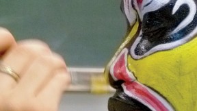 Detail of “Painting Faces of Beijing Opera,” by Christine Shen ’12, on display in lamont library