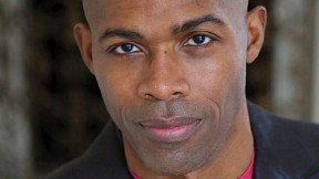 Headshot photograph of Ian K. Smith