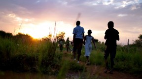 Children from New Hope orphanage in Busia, Uganda, make their nightly walk to get water for drinking and washing. They handle all the chores themselves—an important part of director Ken Mulago’s strategy for running the orphanage. “We want our children to behave as responsible adults,” he says. “We don’t want to raise them up just to think about themselves.”