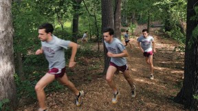 Cross-country captain Daniel Chenoweth  running hill repeats at Fresh Pond 