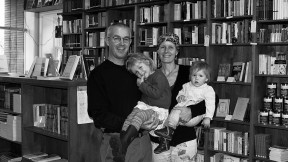 Happily at home: Brian Buckley, Katherine Hunter, and their children in the family’s poetry bookstore in Boulder.