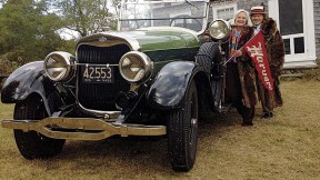 Robert Norton Ganz Jr. and his wife, Anne, give pride of place to his 1925 Lincoln convertible.