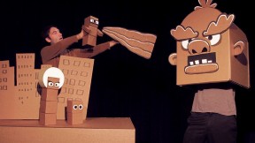 Brad Shur performing in his new show, Cardboard Explosion!