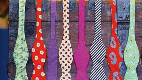 A display rack holding colorful men’s bow ties