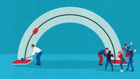 An illustration of social capital, the subject of the book being reviewed, in the form of an individual versus a group working together