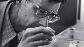 Photograph of E.O. Wilson observing ants