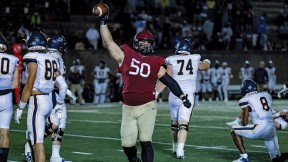 Defensive lineman Thor Griffith, a junior, celebrating  two sacks and a game-high nine tackles against Merrimack