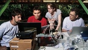 Bernardo Flores, Rafael  Tapajós, and Hannah Horowitz ’11 learn how to analyze data  gathered from a weather balloon under the supervision of  Professor Steven Wofsy