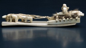 The Inuit artist who created this dogsled from carved ivory, leather, and sealskin is unknown.