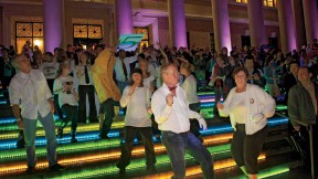 Kicking up their heels: a “flash mob” started off the evening’s dancing with a choreographed routine to the tune of James Brown’s “Papa’s Got a Brand New Bag.”