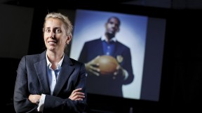 Anita Elberse, backed by a picture of basketball superstar LeBron James, an important figure in her book <i>Blockbusters</i> 