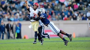 Despite the efforts of Yale linebacker Victor Egu, Crimson quarterback Scott Hosch ’16 managed a flip to freshman receiver Justice Shelton-Mosley, who took the ball the rest of the way. The 35-yard touchdown gave Harvard a 14-7 second-quarter lead in The Game.