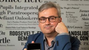 Photo of Geoffrey Fowler with old and new smartphones