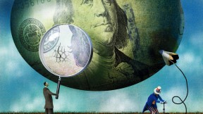 Cracks appear in a balloon decorated like a $100 bill as Uncle Sam fills it with a bicycle pump