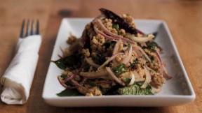 An appetizer of ground pork with onions and basil