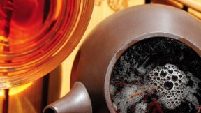 Photo of a steaming pot to tea