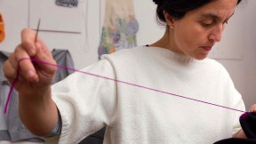 Celia Pym at work with a needle and thread