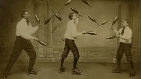 Three men juggle while roller-skating