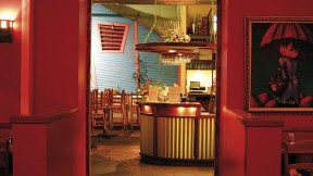 Rich colors and paintings by Latin American artists add to Merengue’s vibrancy. 