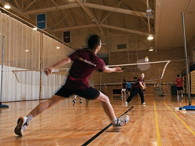A badminton rally in progress at the Malkin Athletic Center. 