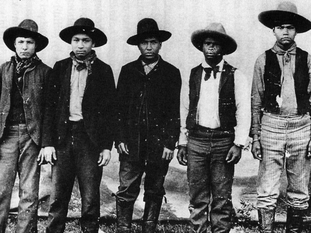 The only known photograph of the Rufus Buck gang, taken in the summer of 1895 in Indian Territory. Buck is in the middle.