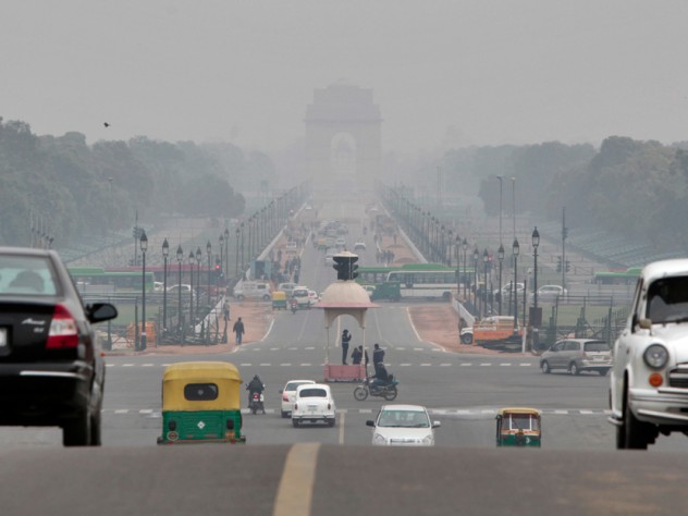 Photograph by Peter Pereira The <em>Rajpath,</em> or King’s Way, in New Delhi runs from the federal government complex to the India Gate monument (seen through morning fog in the distance). It is the route for the annual Republic Day parade.