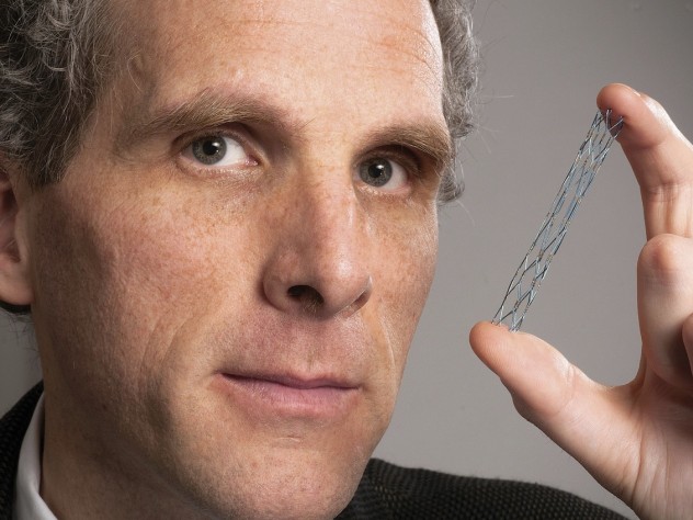 Photograph by Stu Rosner David Jones holds a vascular stent (from the Warren Anatomical Museum), designed circa 1995 by radiologist Morris Simon of Harvard Medical School.
