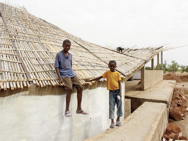 Photograph courtesy of Jordan MacTavish The Sinthian Cultural Center's undulating roof, under construction