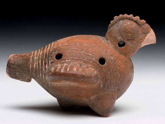 Four-hole ocarina of a bird that resembles a squat chicken