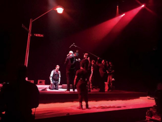 Photograph of a camera crew filming the stage production of Pass Over